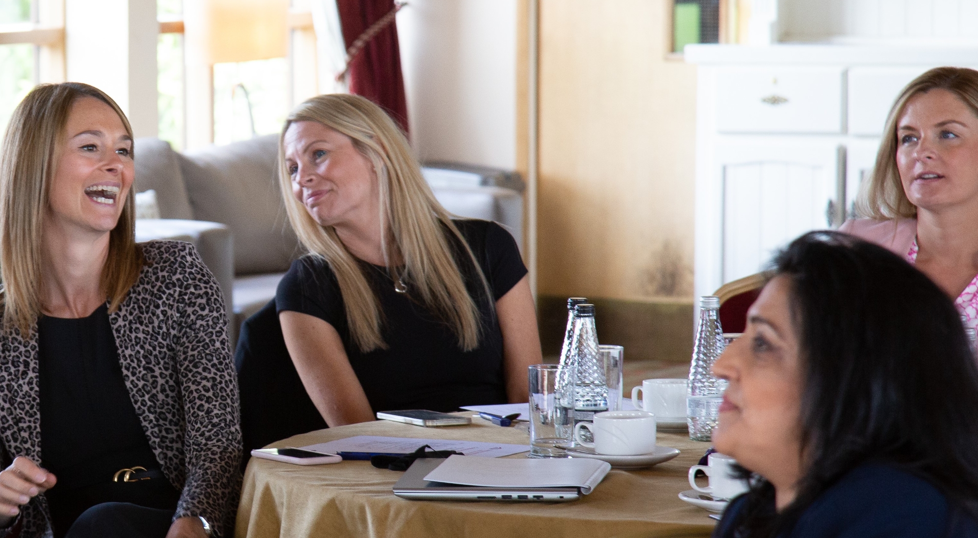 Symphony Learning Trust employees in a meeting