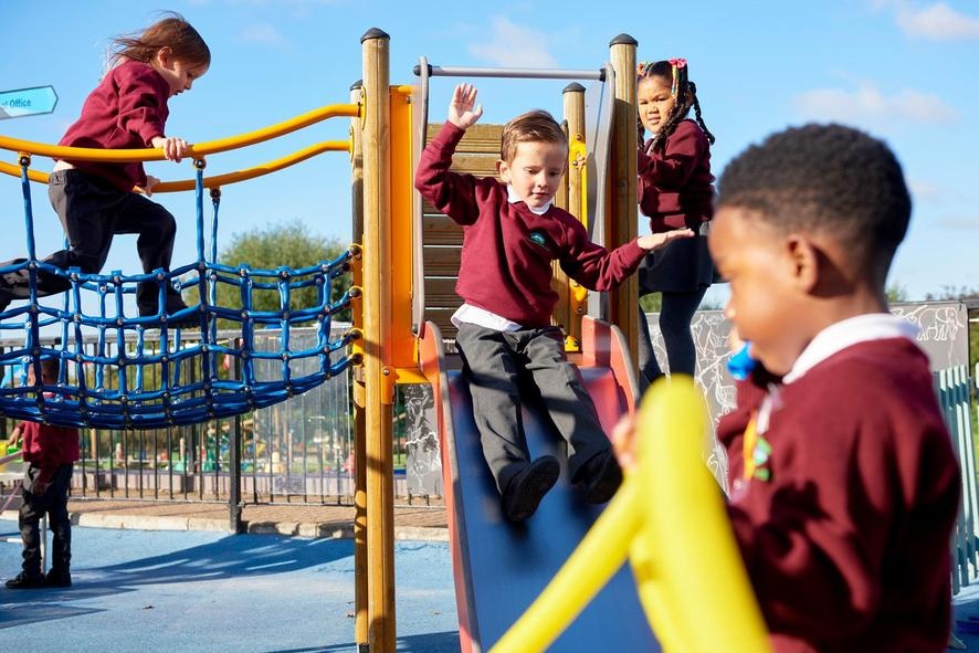 Children having fun in the playground at Downsview primary school
